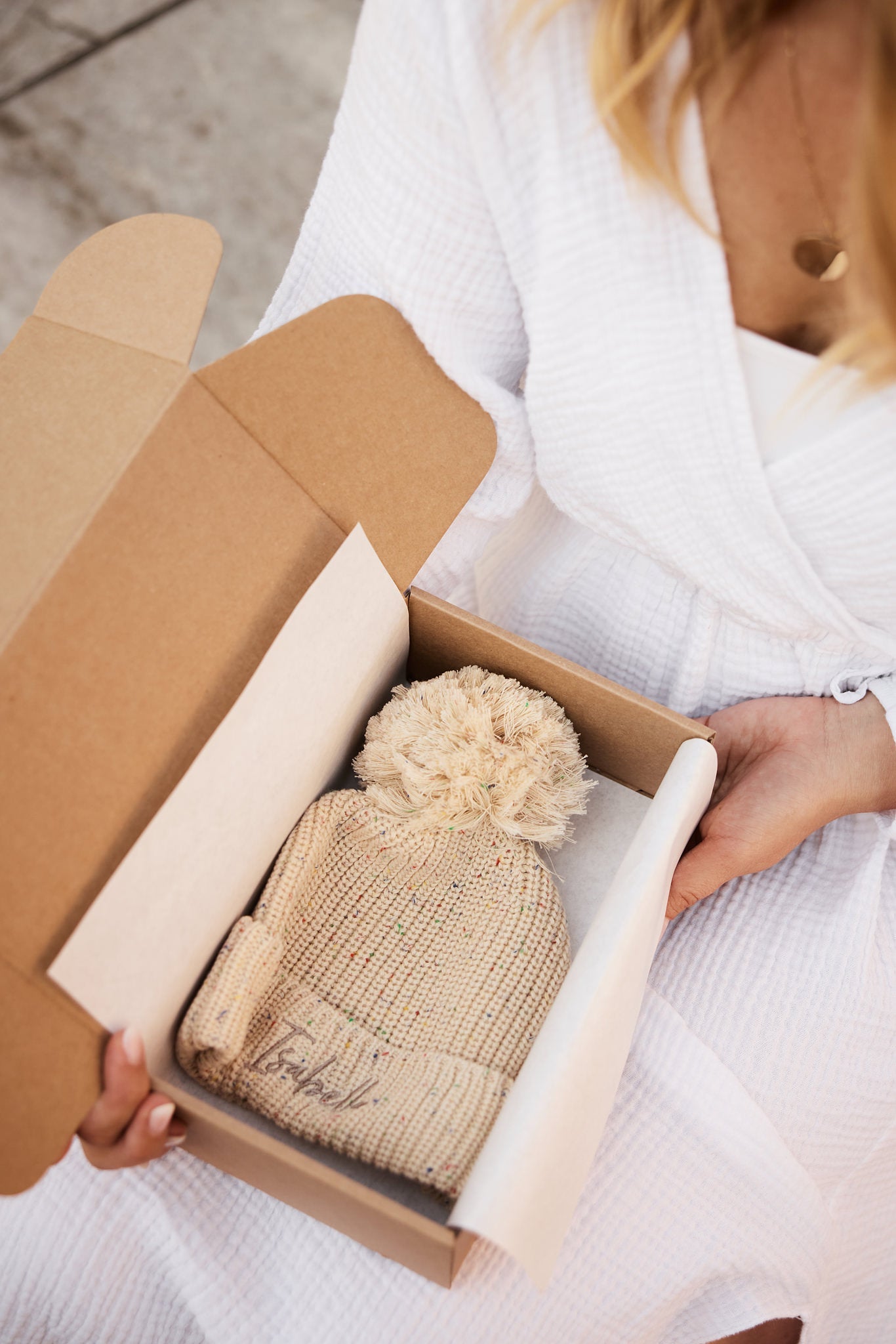 Zimska kapa s cofkom