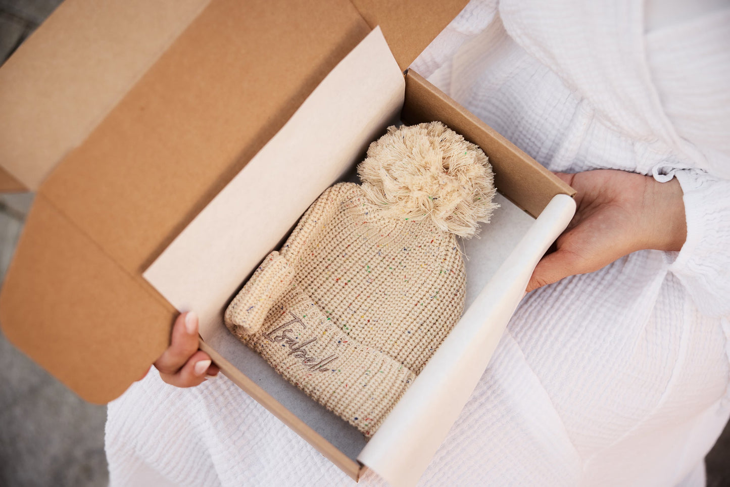 Zimska kapa s cofkom