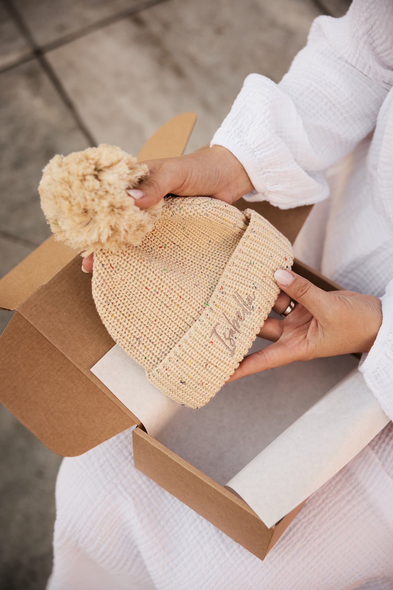 Zimska kapa s cofkom